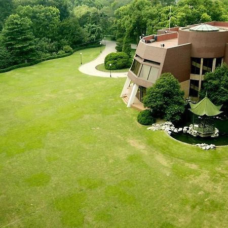 Cypress Hotel Jin Jiang Шанхай Екстериор снимка
